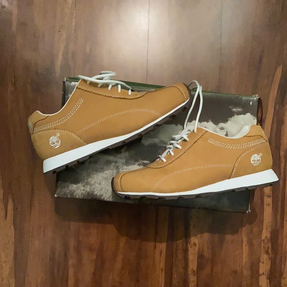 Tan and white Timberland sneaker